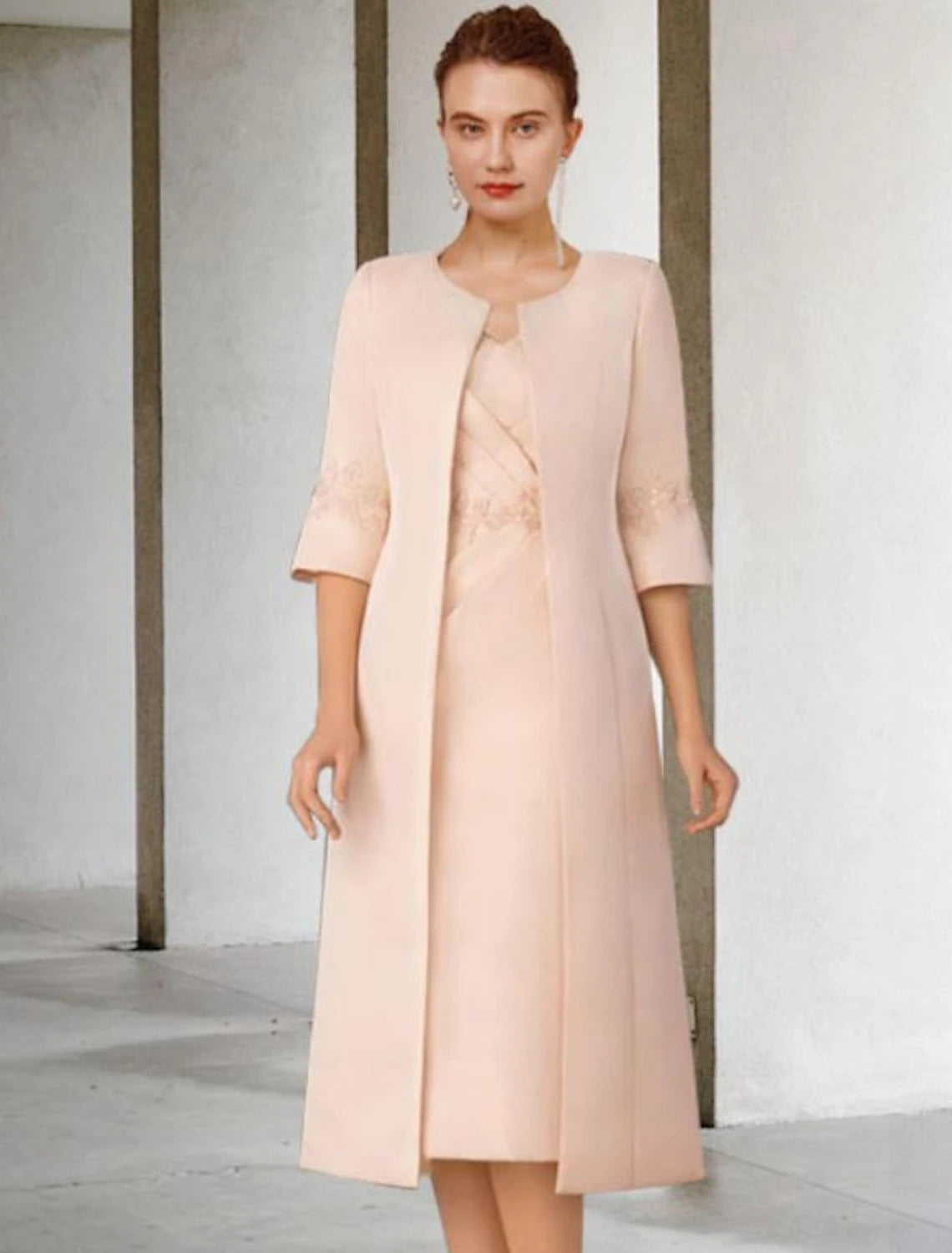 Woman posing in the elegant V-neck chiffon lace two-piece jumpsuit.