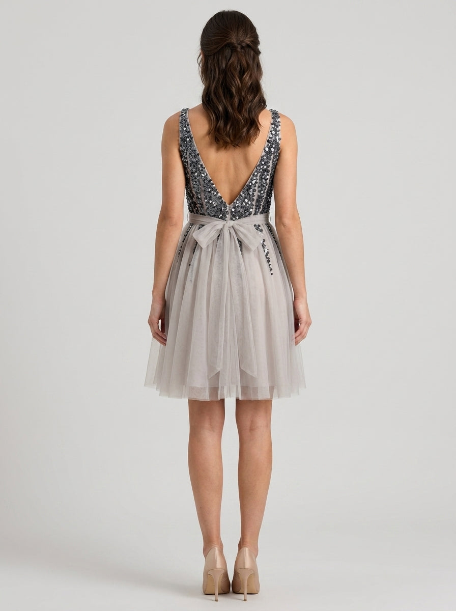 Elegant Sparkling Sequin V-Neck Sleeveless Low V-Back Knee-Length A-Line Homecoming Dresses with Bow Detail