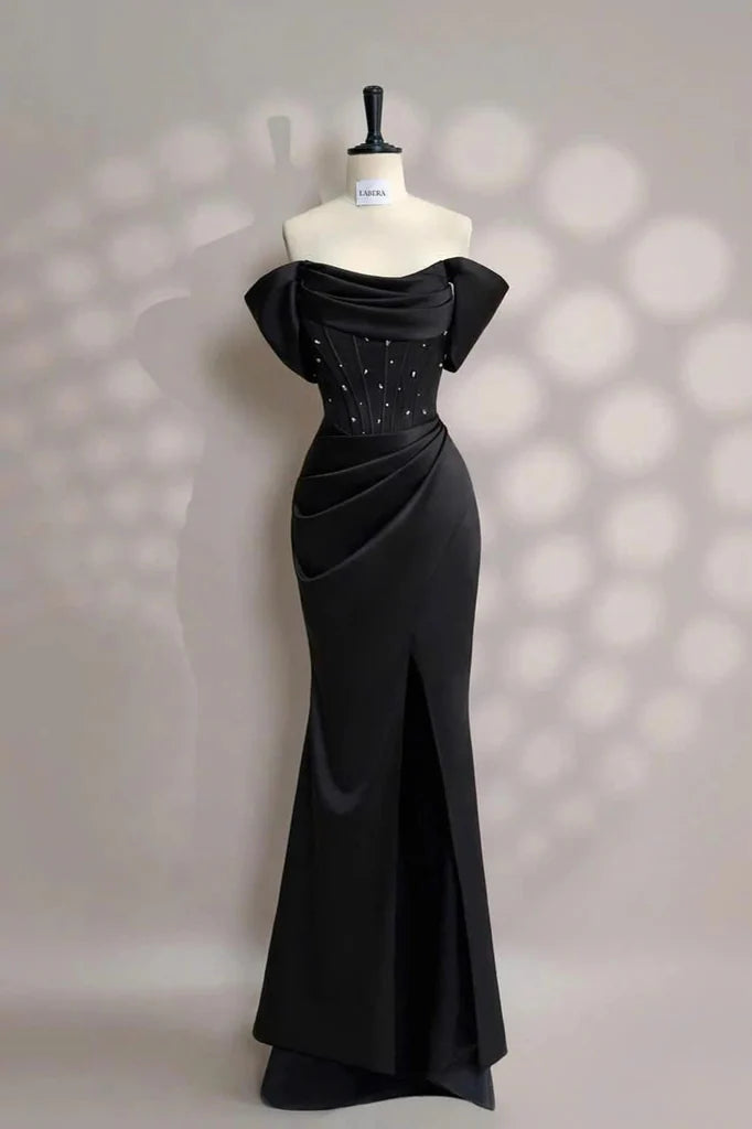 Elegant satin mermaid off the shoulder cowl neck floor length evening dress with beaded corset bodice, draped skirt, oversized bow back and lace up detail