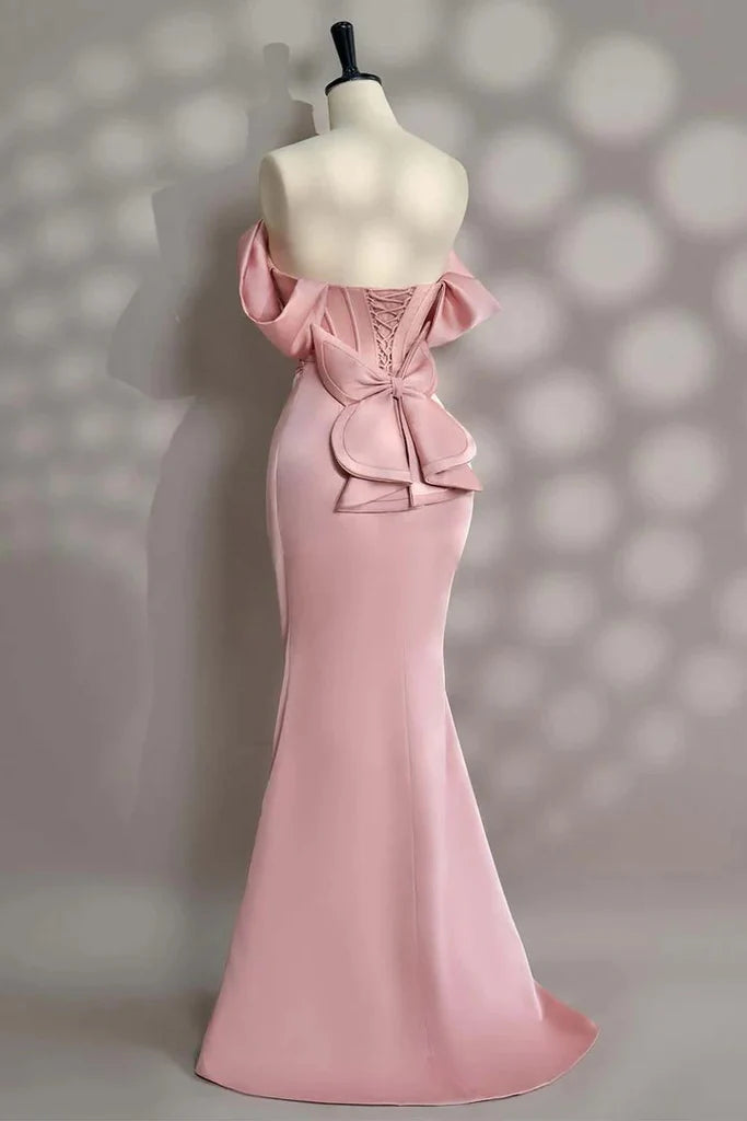Elegant satin mermaid off the shoulder cowl neck floor length evening dress with beaded corset bodice, draped skirt, oversized bow back and lace up detail