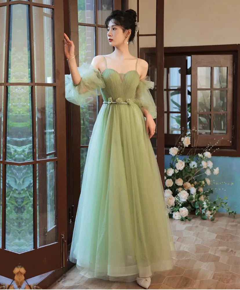 Enchanting Tulle Prom Dresses with Off-the-Shoulder Puff Sleeves, Lace-Up Back and Flowy A-Line Silhouette Formal Gown