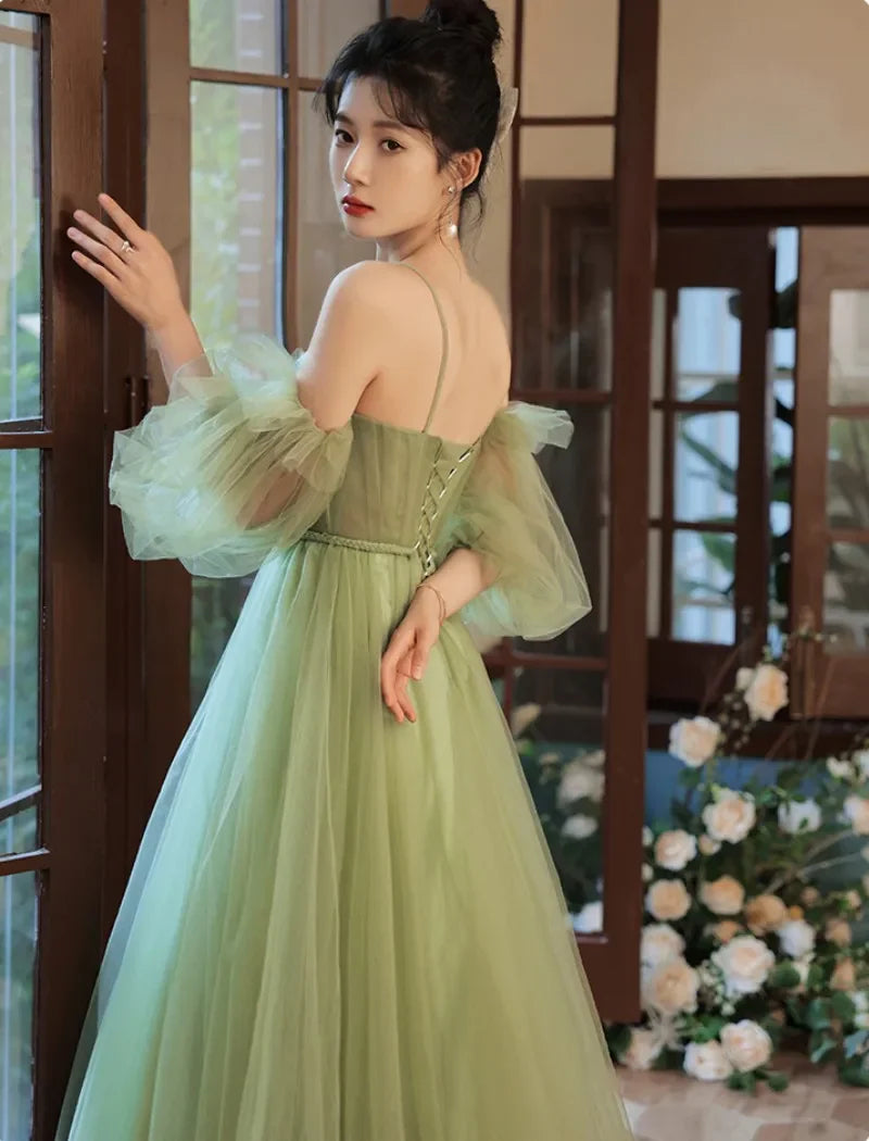 Enchanting Tulle Prom Dresses with Off-the-Shoulder Puff Sleeves, Lace-Up Back and Flowy A-Line Silhouette Formal Gown