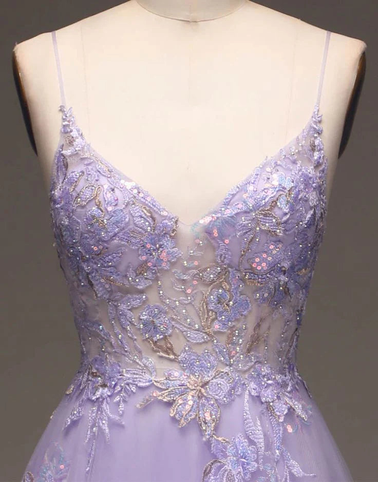 Enchanting lavender tulle prom dress with spaghetti straps, V-neck, beaded floral appliqués, and A-line skirt