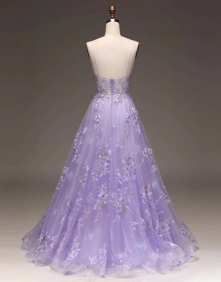 Enchanting lavender tulle prom dress with spaghetti straps, V-neck, beaded floral appliqués, and A-line skirt