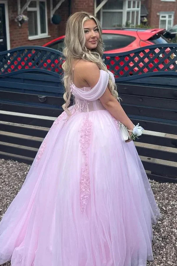 Enchanting off-the-shoulder tulle ball gown with lace appliqué and voluminous skirt