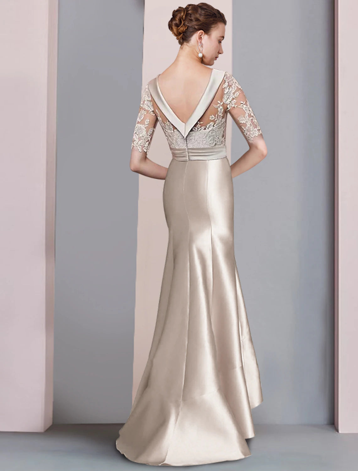 Side view of the formal mermaid trumpet dress, showcasing its elegant silhouette and sweep train.
