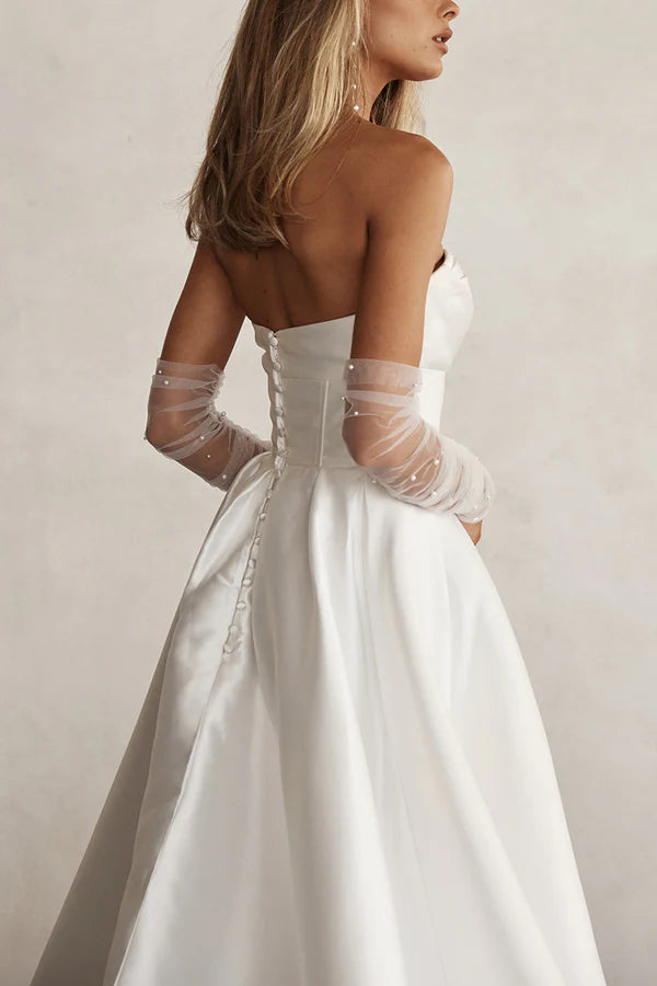 Robe de mariée en satin plissé à manches simples et douces