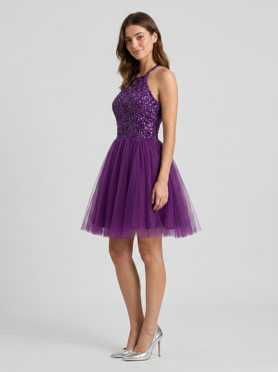 Close-up of sequin bodice and halter neckline on purple homecoming dress.