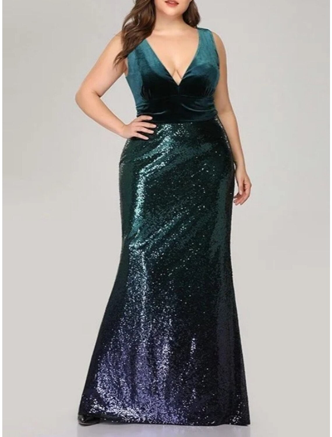 Model wearing a shimmering mermaid V-neck formal gown.