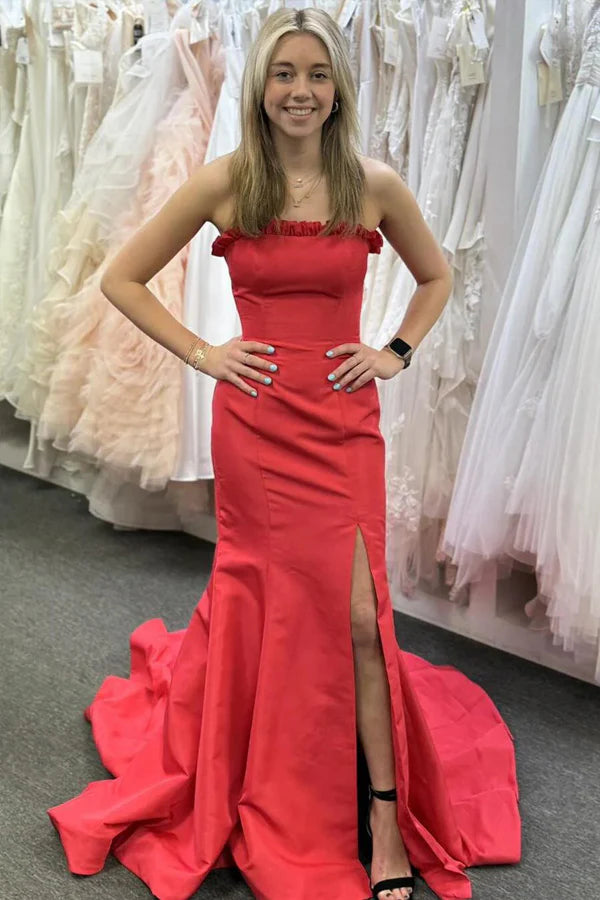Striking strapless satin prom gown with ruffle trim, lace-up back, high slit and mermaid train