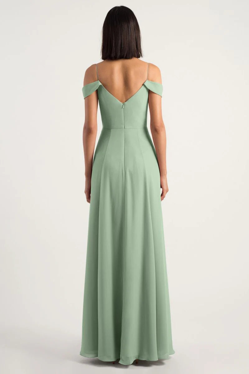 V-neck sleeveless thin shoulder strap backless side slit and floor length evening dress