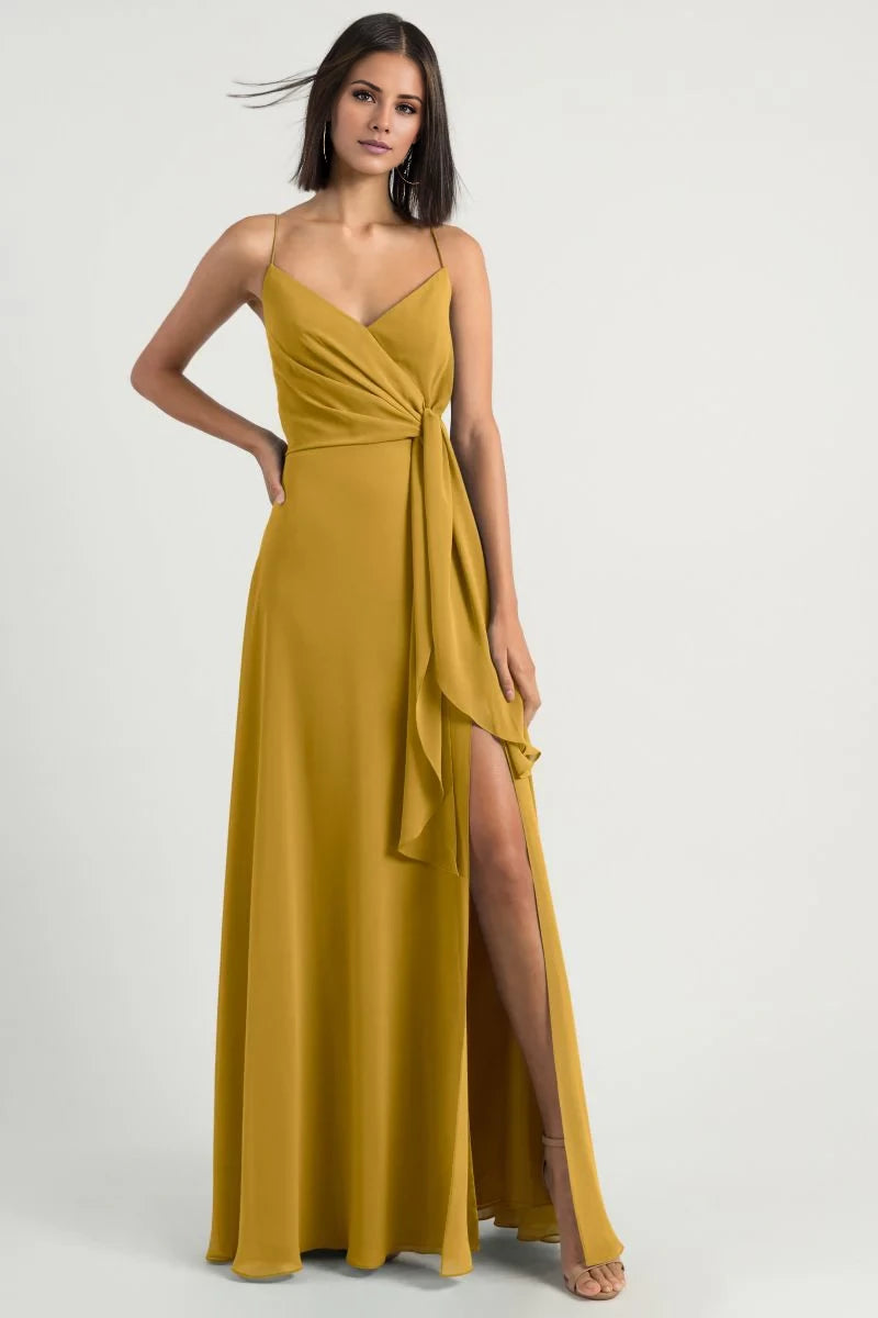 V-neck sleeveless thin shoulder strap backless side slit and floor length evening dress