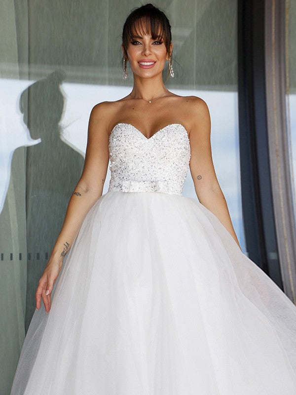 Robe de mariée en tulle, décolleté en cœur, nœud papillon, sans manches, longueur au sol