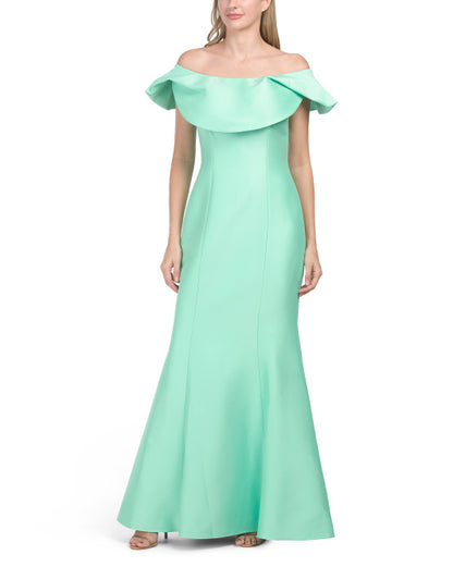 A minimalist strapless and floor length prom dress