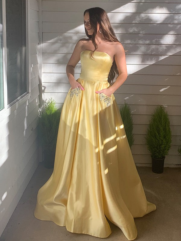 A-Line/Princess Sleeveless Beading Satin Strapless Sweep/Brush Train Dresses