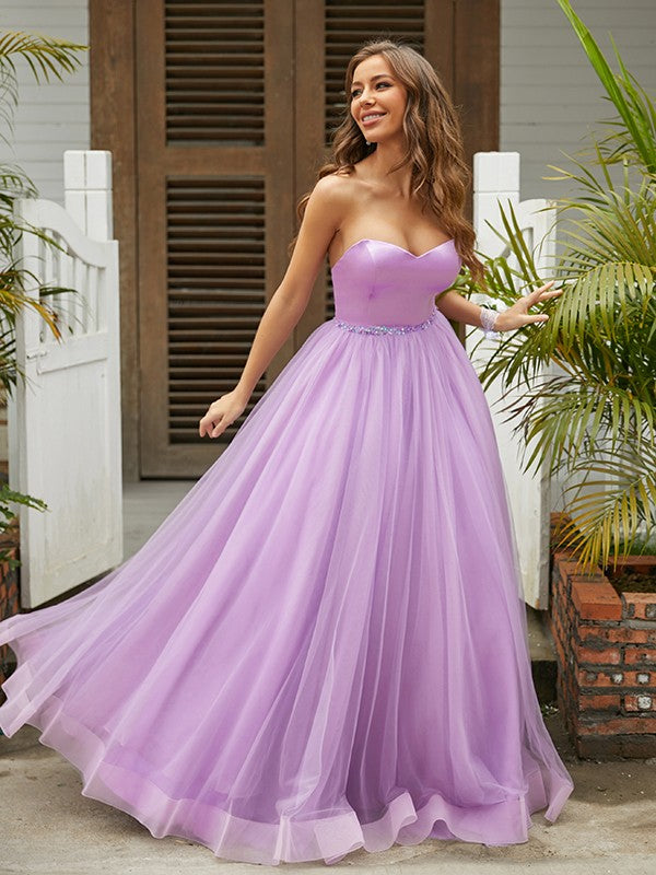 Robe trapèze/princesse en tulle à volants, décolleté en cœur, sans manches, longueur au sol