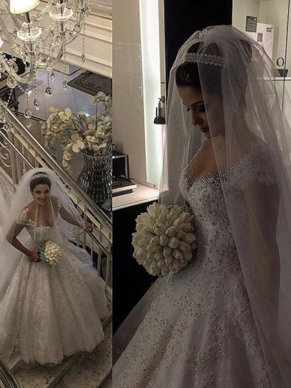 Robe de mariée en tulle, sans manches, col en V, perles, longueur au sol