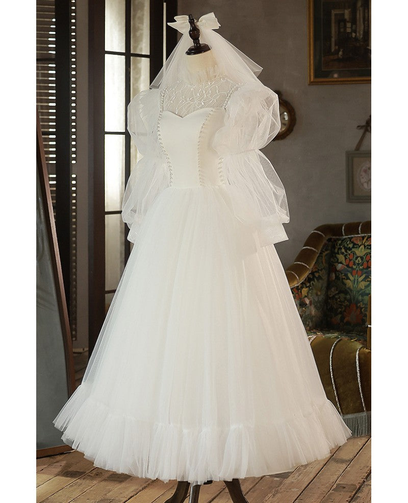 Robe de mariée élégante en ivoire avec perles, col haut, manches 3/4, en forme de A, finement brodée, dos nu, longue