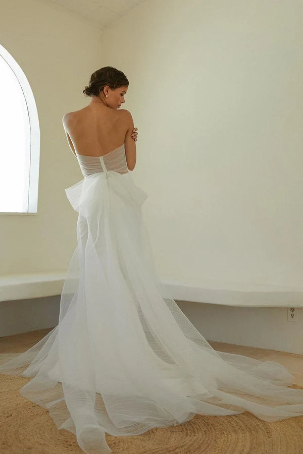 Robe de mariée sirène ivoire unique avec pendentif sans bretelles