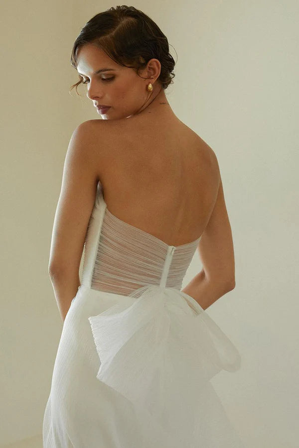 Robe de mariée sirène ivoire unique avec pendentif sans bretelles