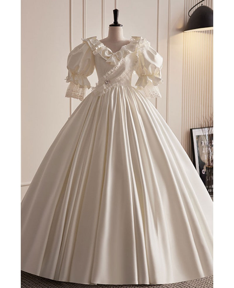 Vintage ivory pearl rhinestone bow short sleeved wedding dress ivory satin ruffled V-neck backless and ground length wedding dress